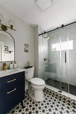 a bathroom with a toilet and a glass shower at Perch Cottages #15 - Creek Access, Sauna, Mt views in Boiceville