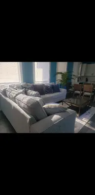 a living room with two couches and a couch at Tasteful 3bedroom Vacation home in Newark