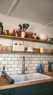 a kitchen counter with a sink and a shelf with utensils at Charming Mtn Stay Views, Hot Tub, Prime Location in West Kill
