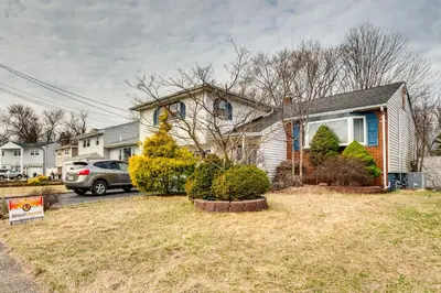 a house with a car parked in a yard at Work, Explore and Relax Centrally Located Union Gem in Union