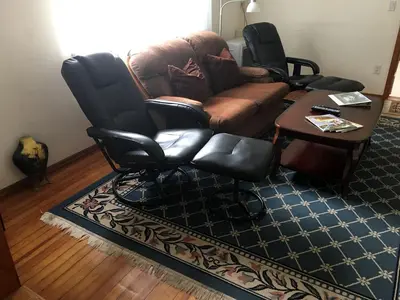 a living room with a couch and chairs and a table at Lovely Cottage Getaway in the Mountains near Phoenicia, New York in Chichester