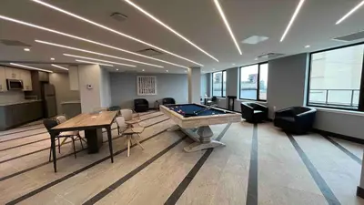 an office with a pool table in a room at Peaceful Quiet Spacious New Modern Penthouse 3-Bedroom Apartment with a Balcony in Brooklyn