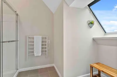 a bathroom with a shower and a window at Stylish Comfort Wooster Square Yale Wi-Fi in New Haven