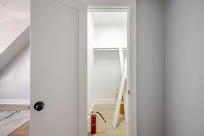 a door leading into a room with white walls at Lrg 2 Bedroom apart in BlackRock in Bridgeport