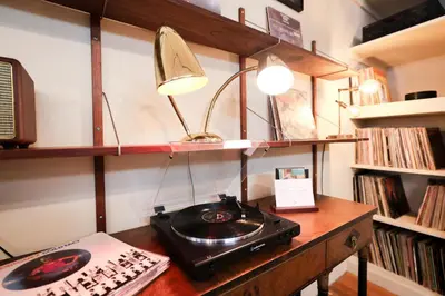 a room with a desk with a radio on it at Artistic Vintage Loft in Williamsburg in Brooklyn