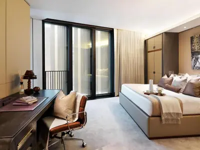 a hotel room with a bed and a desk and a desk at Alerona in New York