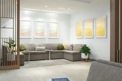 a living room with a couch and a table at Element Lenox Berkshires in Lenox