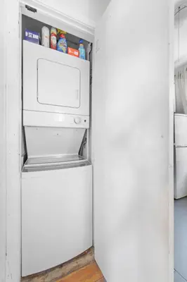 a refrigerator with its door open in a kitchen at Best Location in Greenwich Village in New York