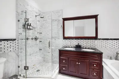 a bathroom with a shower and a sink at Luxury Oasis in Manhattan in New York