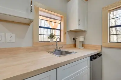 a kitchen with a sink and a window at Close to Trails Studio with Water Views in Wurtsboro