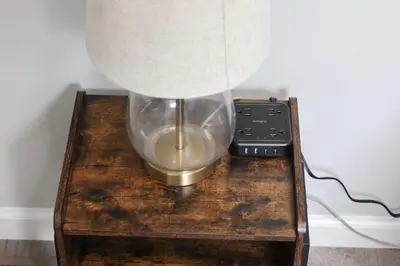 a lamp on a wooden table with a lamp on it at 3Bed 2Bath Apt Near NYC plus Parking and Laundry in Irvington