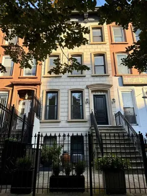 a building with a fence in front of it at Luxury Oasis in Manhattan in New York