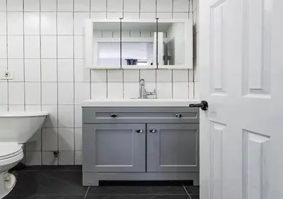 a bathroom with a sink and a toilet at Cozy Studio! Steps to Central Park & Upper E Side!, June To Aug 90 Days Stay Required in New York