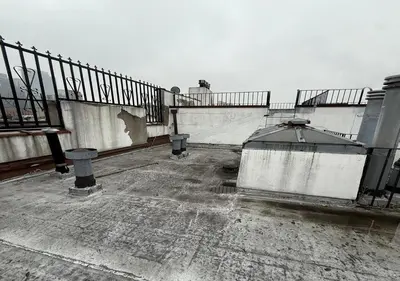 an abandoned building with a fence and stairs on it at Outdoor Space Washer Dryer Dishwasher 3Beds Apt, June to Aug 90 days stay required in New York