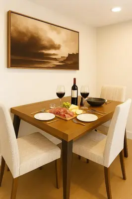 a dining room table with two chairs and wine glasses at Westville Stay 2BR Near Yale in New Haven