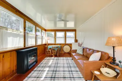 a living room with a couch and a fireplace at 4 Mi to Great Barrington Berkshires Retreat! in Sheffield