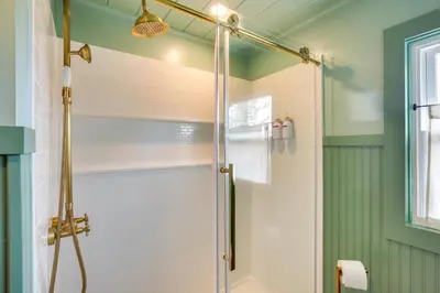 a shower with a glass door in a bathroom at 4 Mi to Great Barrington Berkshires Retreat! in Sheffield