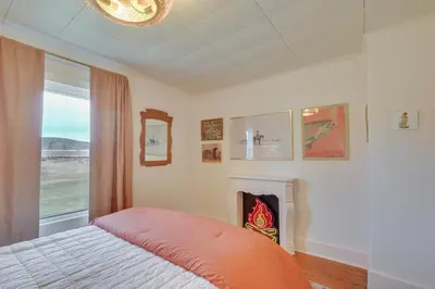 a bedroom with a bed and a window at 4 Mi to Great Barrington Berkshires Retreat! in Sheffield