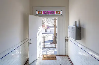 an open door with a sign that reads hospital at Family Apt: 2BR FREE Parking Airprt City Links in Newark