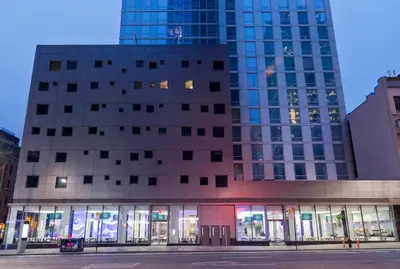 a large building with a lot of windows at Riu Plaza New York Times Square in New York