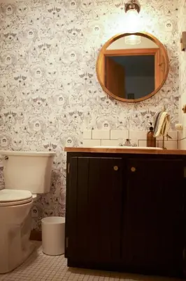 a bathroom with a toilet and a mirror at Bellwood Cottage 8-14min to all Roxbury Wed Venues in Roxbury