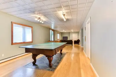 a room with a pool table in it at Catskills retreat - ATV, Hot tub, hiking, fishing in Cairo