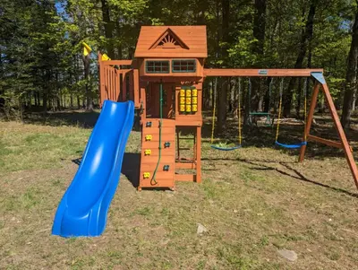 a playground with a slide and a play house at Catskills retreat - ATV, Hot tub, hiking, fishing in Cairo
