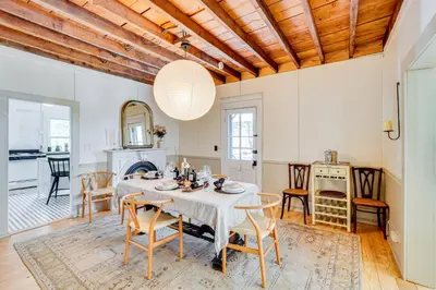 a dining room with a table and chairs at 7 Mi to Belleayre Ski Mountain Getaway with Porch in Fleischmanns