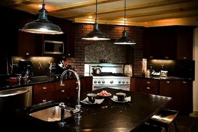 a kitchen with a sink and a stove top oven at Rustic Log Cabin in the Catskills, Upstate New York in Olivebridge