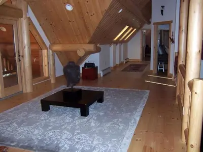 a living room with a couch and a coffee table at Rustic Log Cabin in the Catskills, Upstate New York in Olivebridge