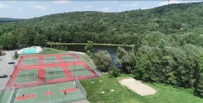 an overhead view of a tennis court with four tennis at Home in Bushkill Saw Creek Poconos area in Saw Creek
