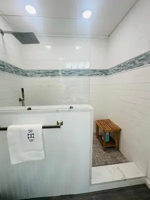 a white bathroom with a sink and a towel at Connecticut Waterfront Home, With Hot Tub, Cozy in Rocky Hill