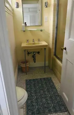 a bathroom with a sink and a toilet at Luxury Estate Elegant Private The White Lion Manor in Middletown