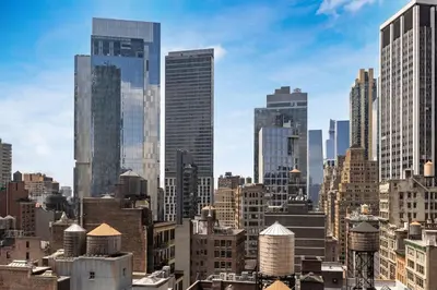 a view of a city skyline with tall buildings at The Vibe on 5th Vibe 8750 in New York