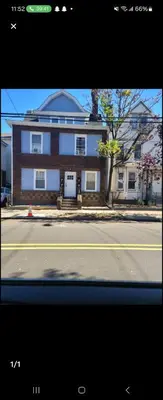 a house on the side of a street at Lemon king room 4 in Newark