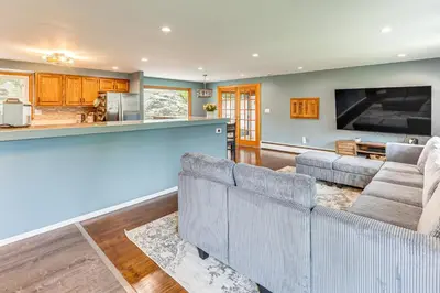 a living room with two couches and a kitchen at Home 2 Mi to Thayer Gate at U S Military Academy in Highland Falls
