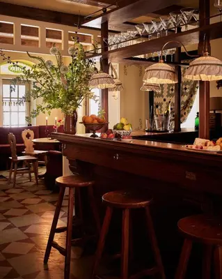 a bar in a restaurant with stools at Six Bells Countryside Inn in Rosendale