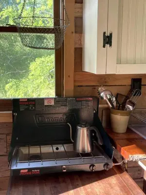 a mixer sitting on a counter in a kitchen at Gorgeous Tiny House Rental for a Glamping Getaway near Saratoga Springs in Upstate New York in Argyle