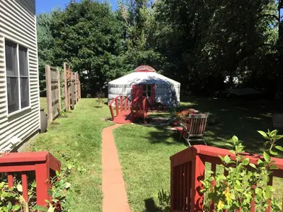 a gazebo in the yard of a house at Authentic Mongolian Yurt for a Serene Healing Retreat in Saratoga Springs, New York in Saratoga Springs