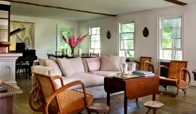 a living room with a white couch and a table at Minimalist Countryside Villa Rental near Albany in Upstate New York in West Fulton