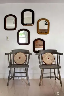 two chairs sitting in front of a wall with mirrors at Minimalist Countryside Villa Rental near Albany in Upstate New York in West Fulton