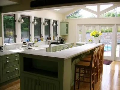 a kitchen with a large island with a counter top at Impressive Cabin with a Pool and Hot Tub Ideal for Weekend Getaways in the Catskills in Hunter