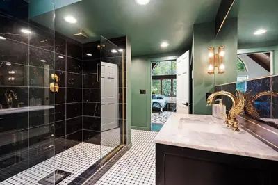 a bathroom with a sink and a shower at Catskill Estate epic views hot tub in Kingston