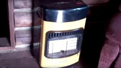 a close up of a bottle with a microwave in it at Pet-Friendly Rustic Cabin on Grafton Mountain, New York in Johnsonville