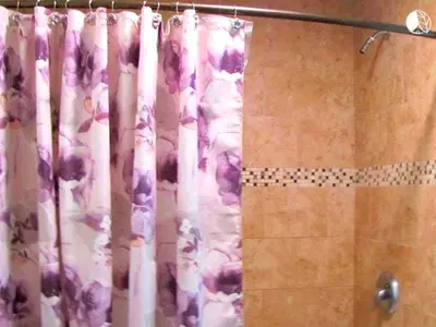 a shower with a purple shower curtain in a bathroom at Charming Waterfront Cottage Rental near Topsmead State Forest, Connecticut in Harwinton