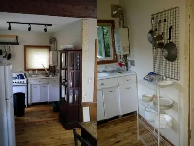 a kitchen with white cabinets and a white refrigerator at Romantic Mountain Cabin with Stunning Views in Ulster County, New York in Shandaken