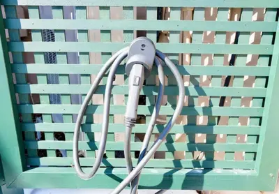 a hair dryer hanging from the back of a bench at Gorgeous Green Mountains Vacation Rental with a Pool in Manchester, Vermont in Manchester Center
