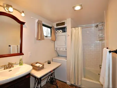 a bathroom with a sink and a toilet and a shower at Idyllic Getaway Cottage in the Woods near Woodstock, New York in Woodstock
