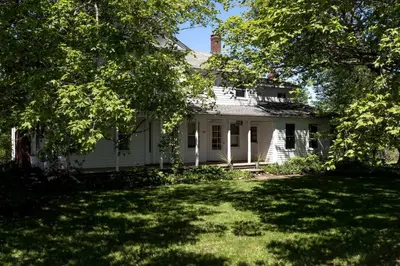 an old white house with a large yard at Secluded Cottage Rental with a Fireplace in Greenville, New York in Greenville