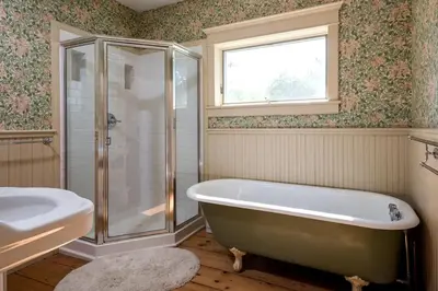 a bathroom with a tub and a shower and a sink at Secluded Cottage Rental with a Fireplace in Greenville, New York in Greenville